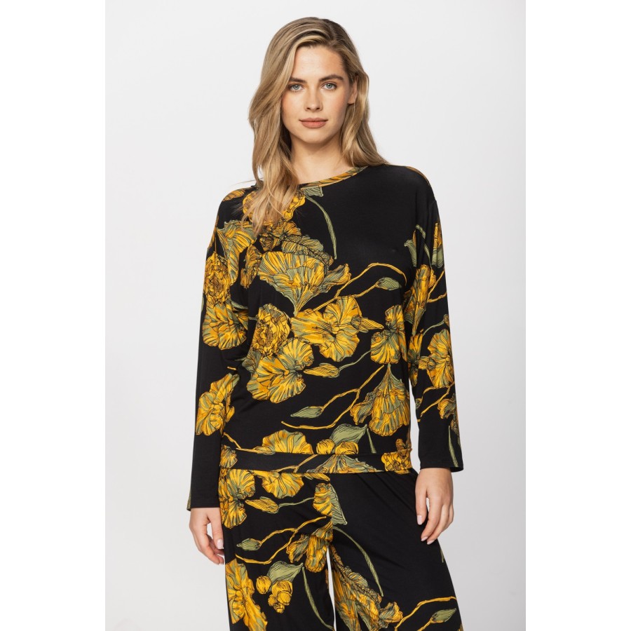 Conjunto pijama mujer micromodal amarillo sobre fondo neutro